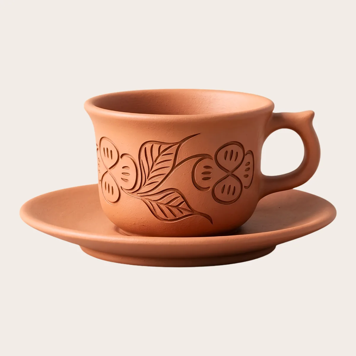 Leaf-Engraved Cup & Saucer